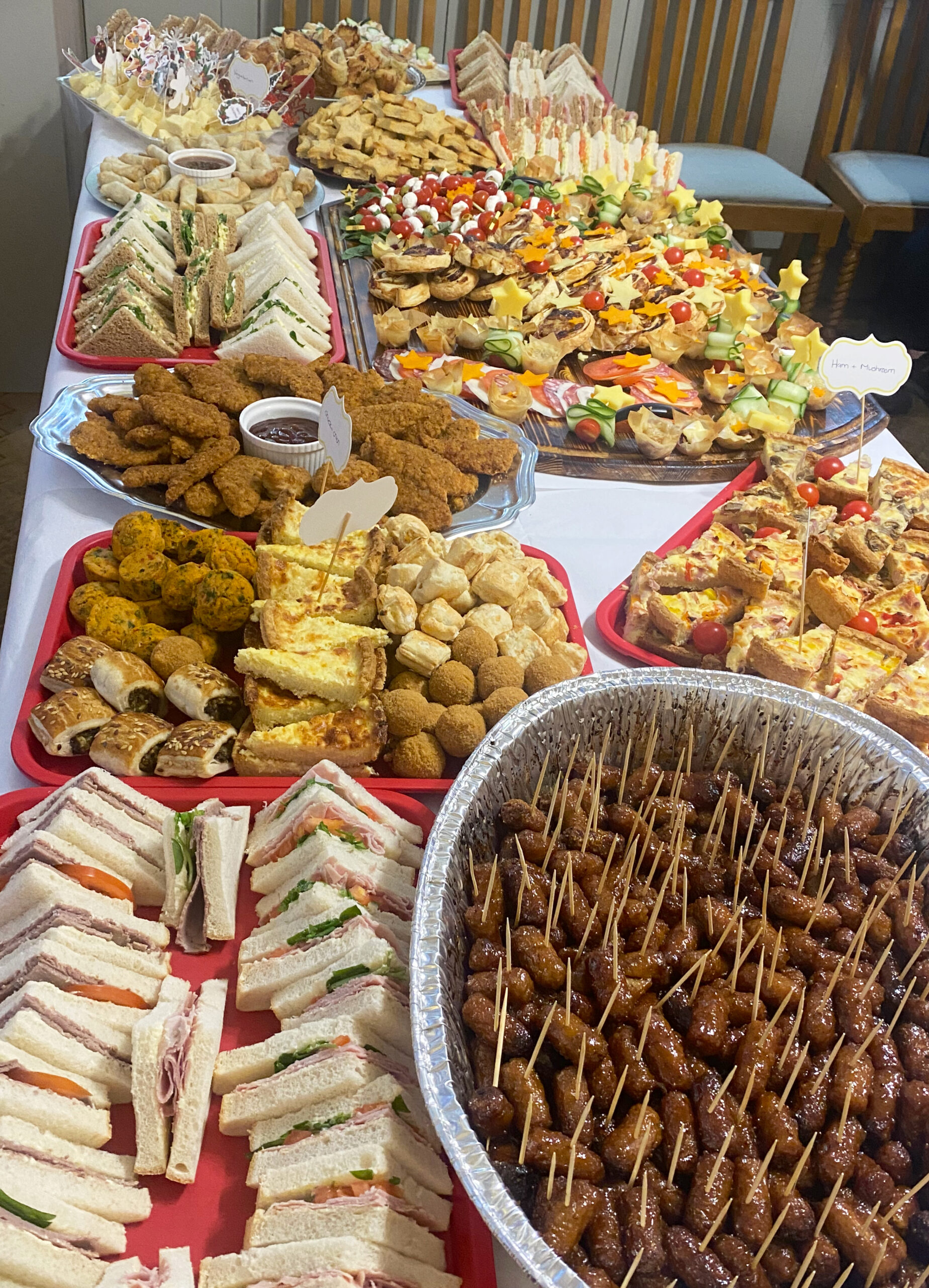 A variety of food platters laid out for an event