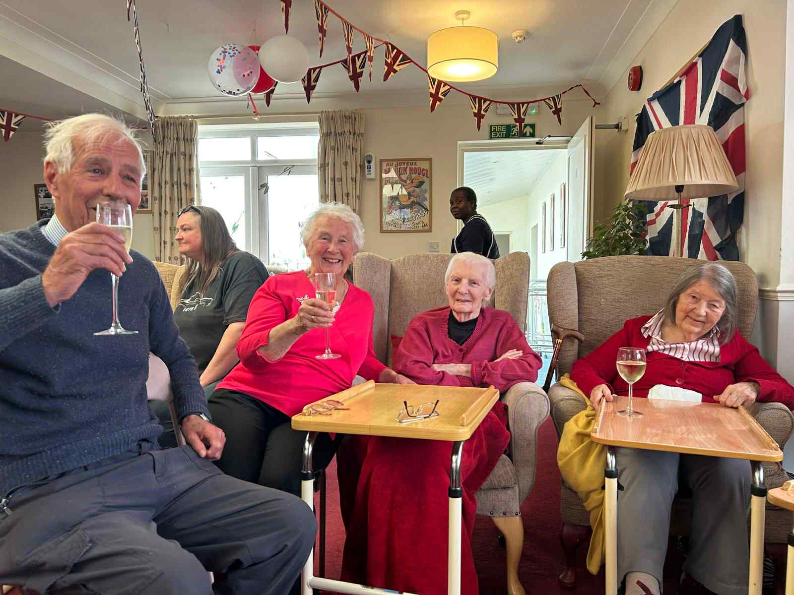 Residents enjoying a celebration in the common area