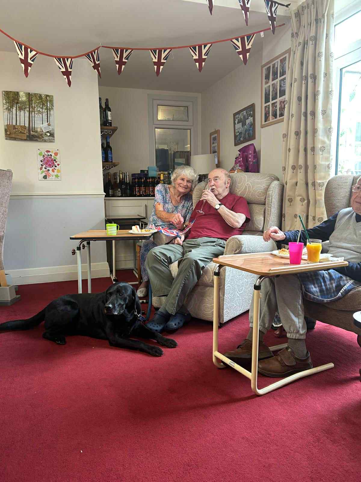 Residents socializing in a cozy common area