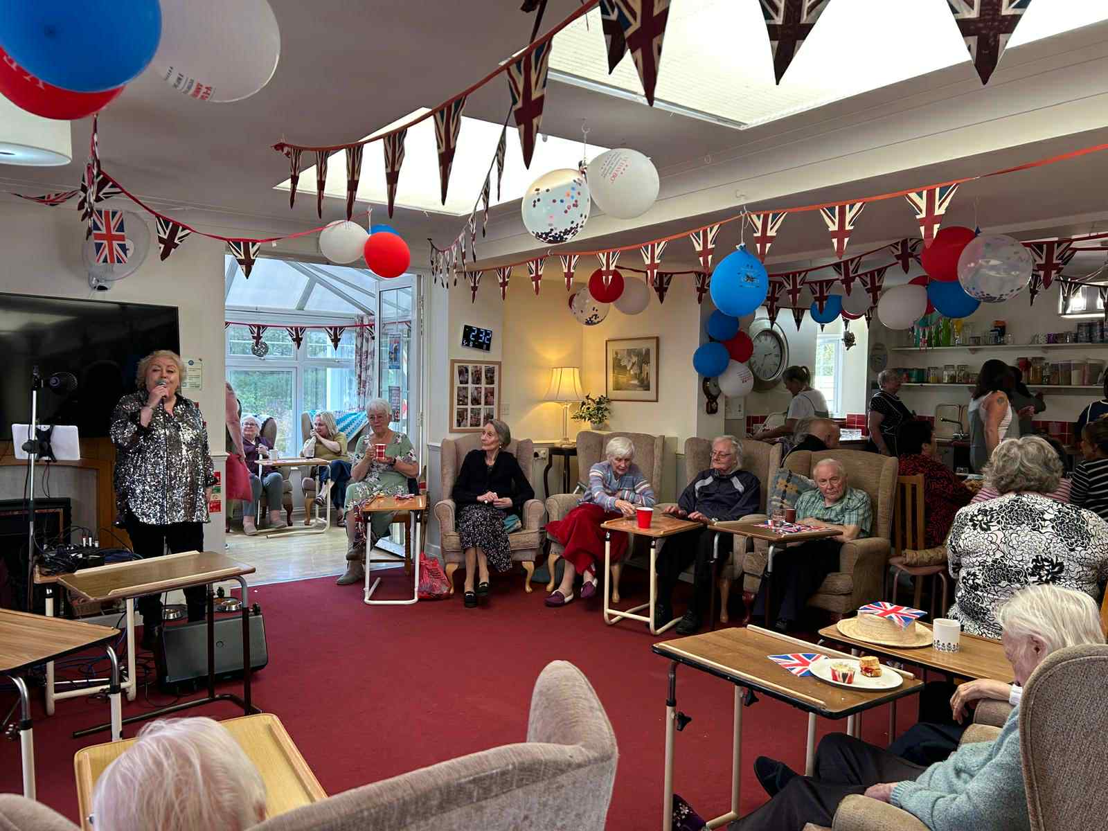 Residents enjoying an indoor activity with decorations