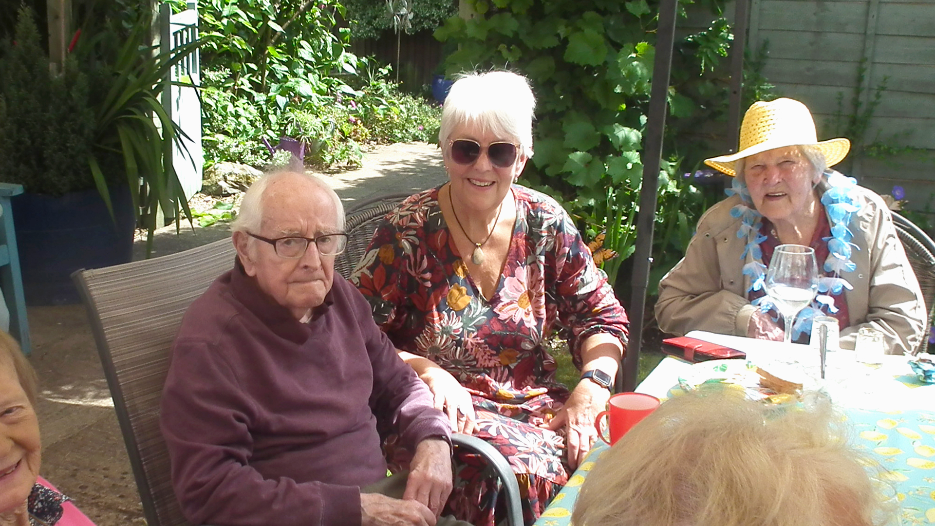 Residents enjoying time in a garden area