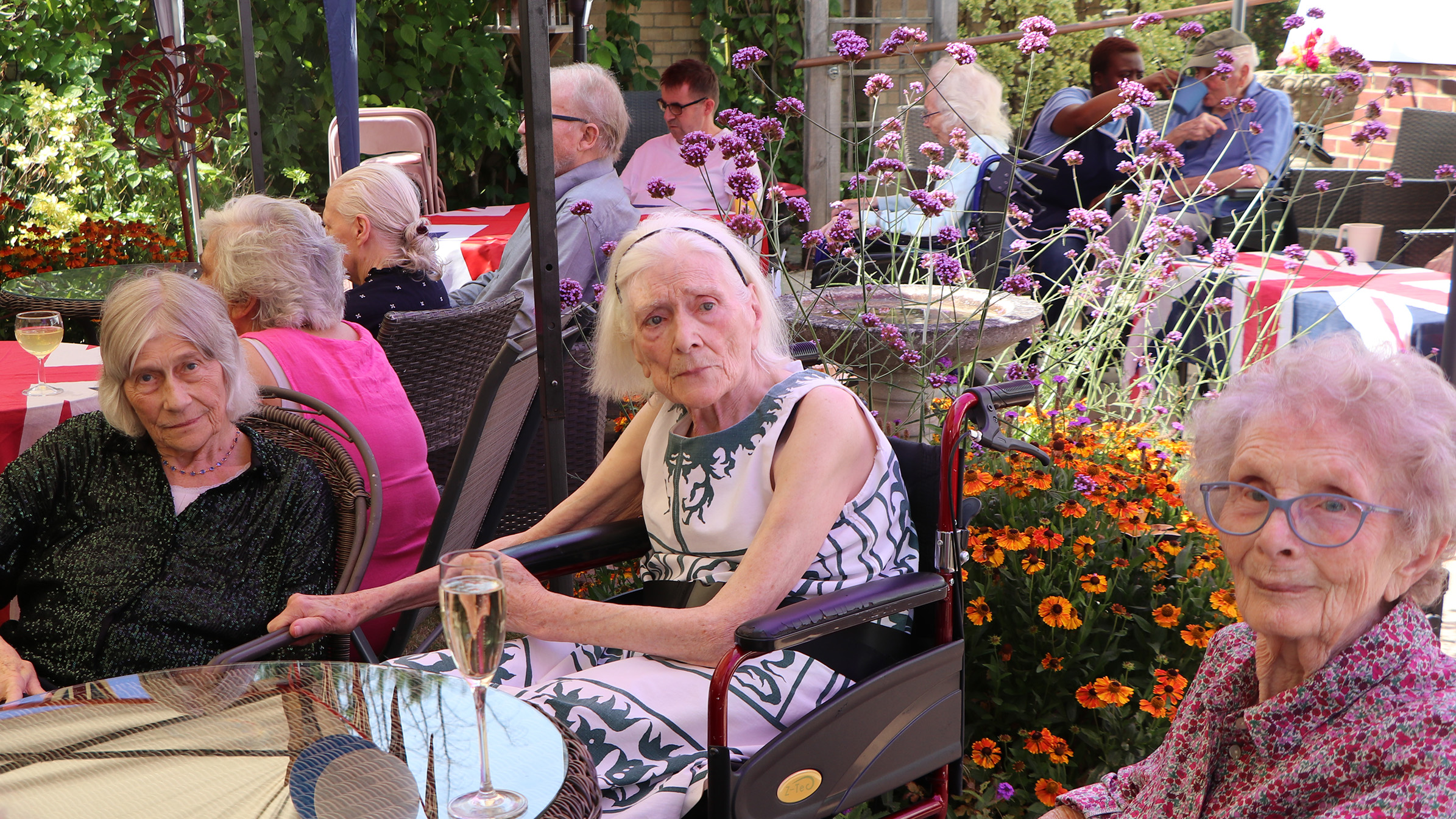 Residents enjoying time outdoors at a garden event