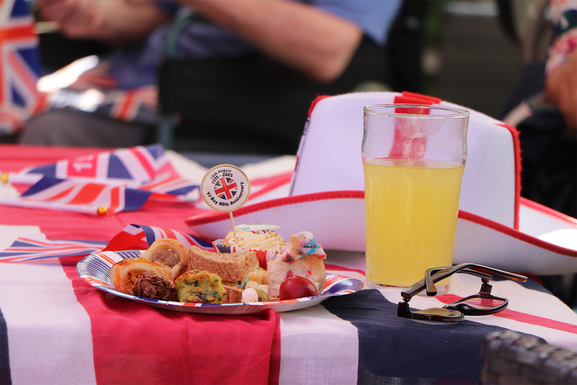 A festive plate of food at a celebration with drinks