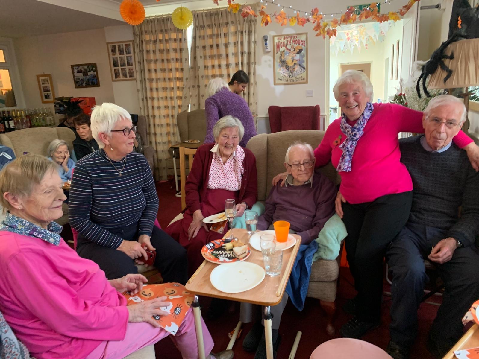 Residents enjoying a gathering in a common area