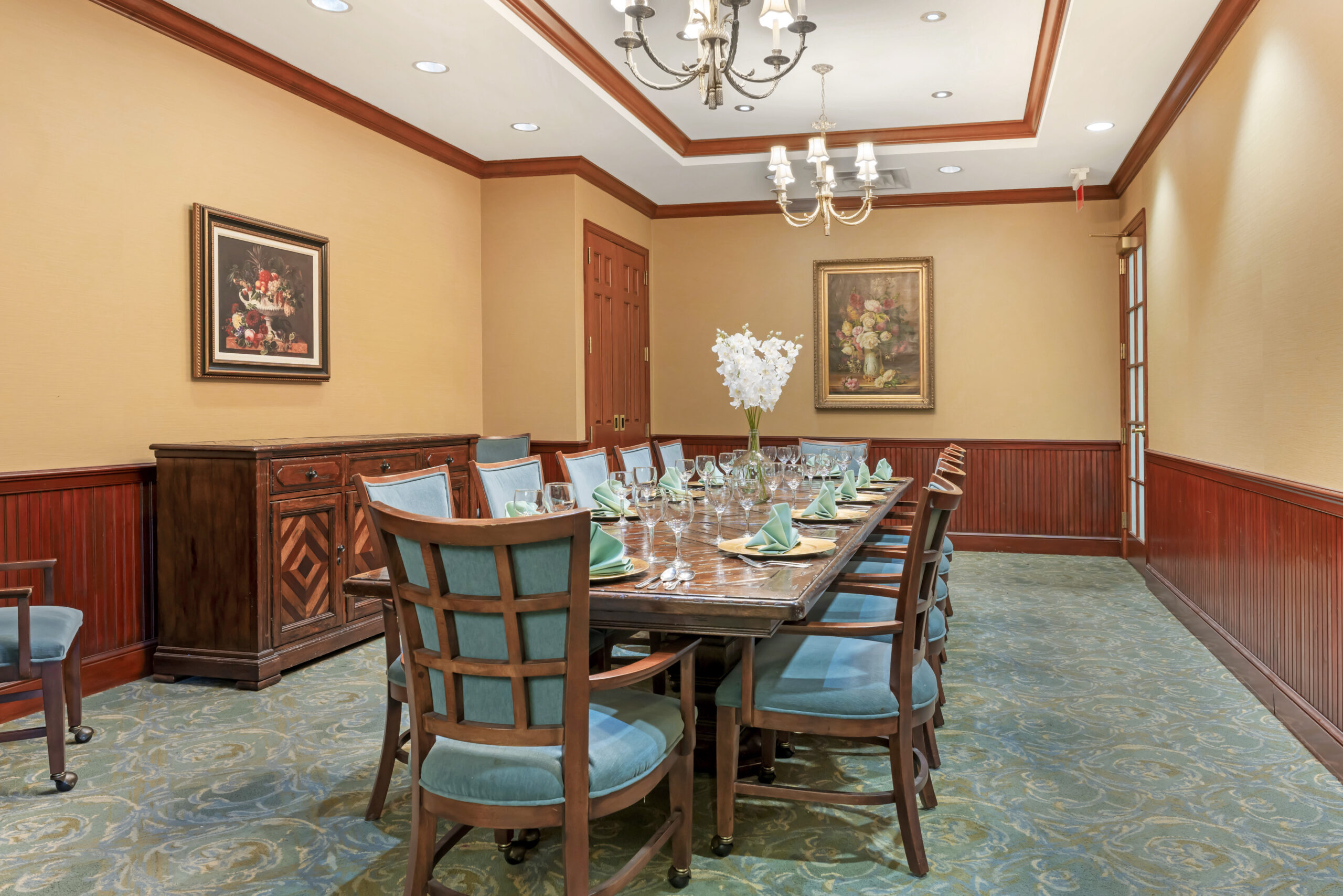 Dining room with a large table set for a meal