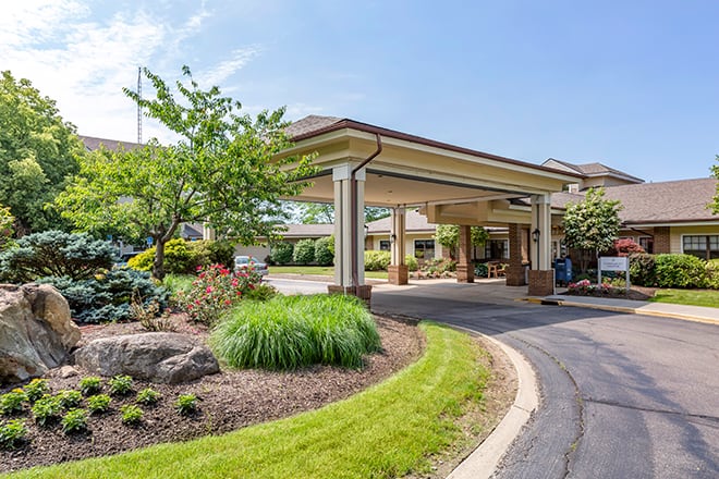 Front entrance of Brookdale Westlake Village with landscaping