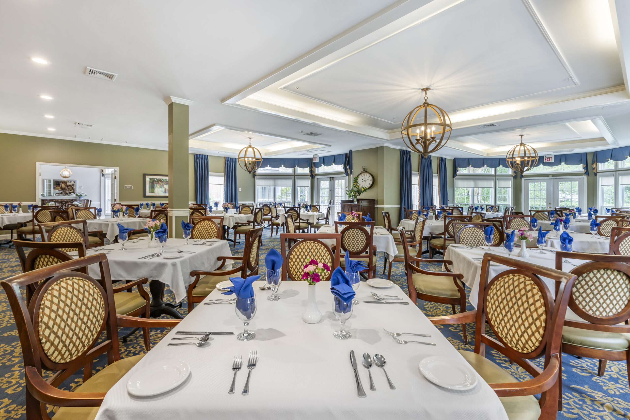 Elegant dining room setup with tables and decorations