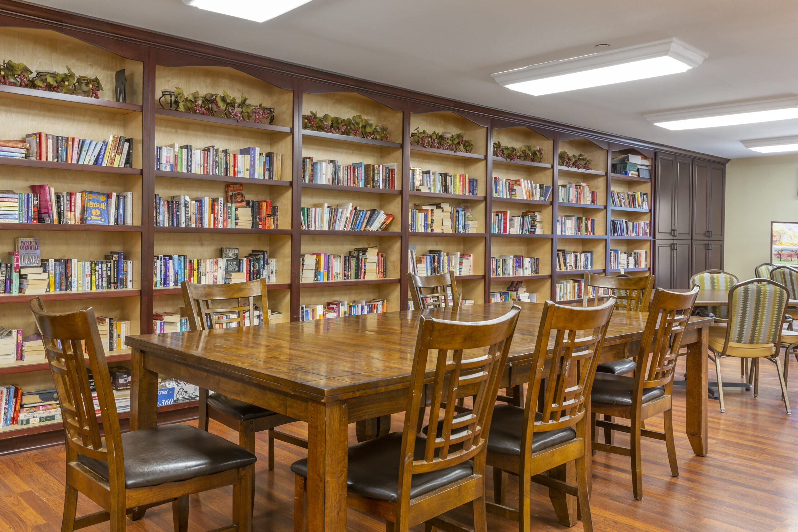 Interior common area with bookshelves and tables