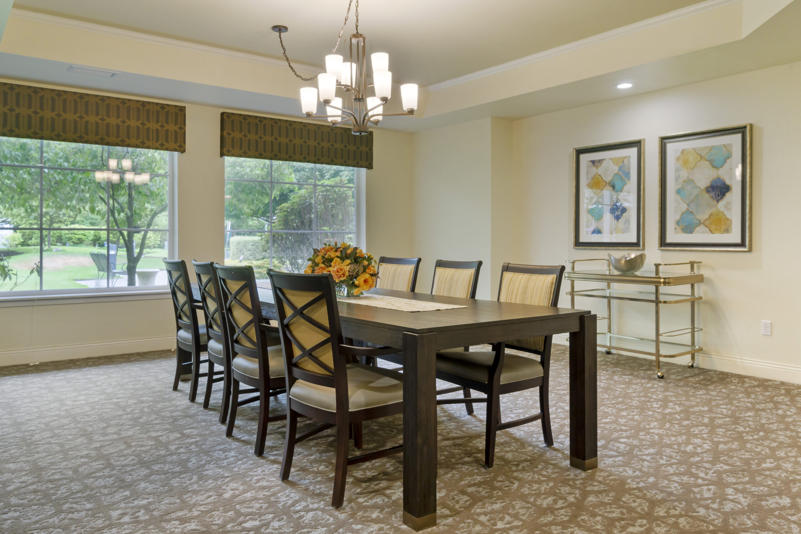 Bright dining room with a large table and chairs