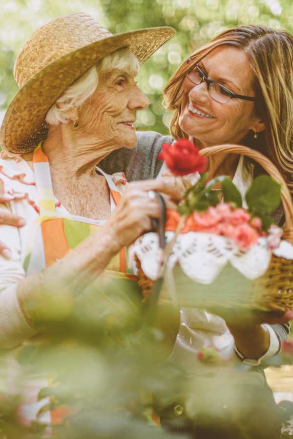 Two women enjoying a moment in the garden.