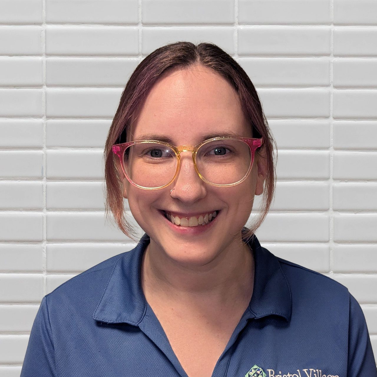 Staff member smiling at Bristol Village