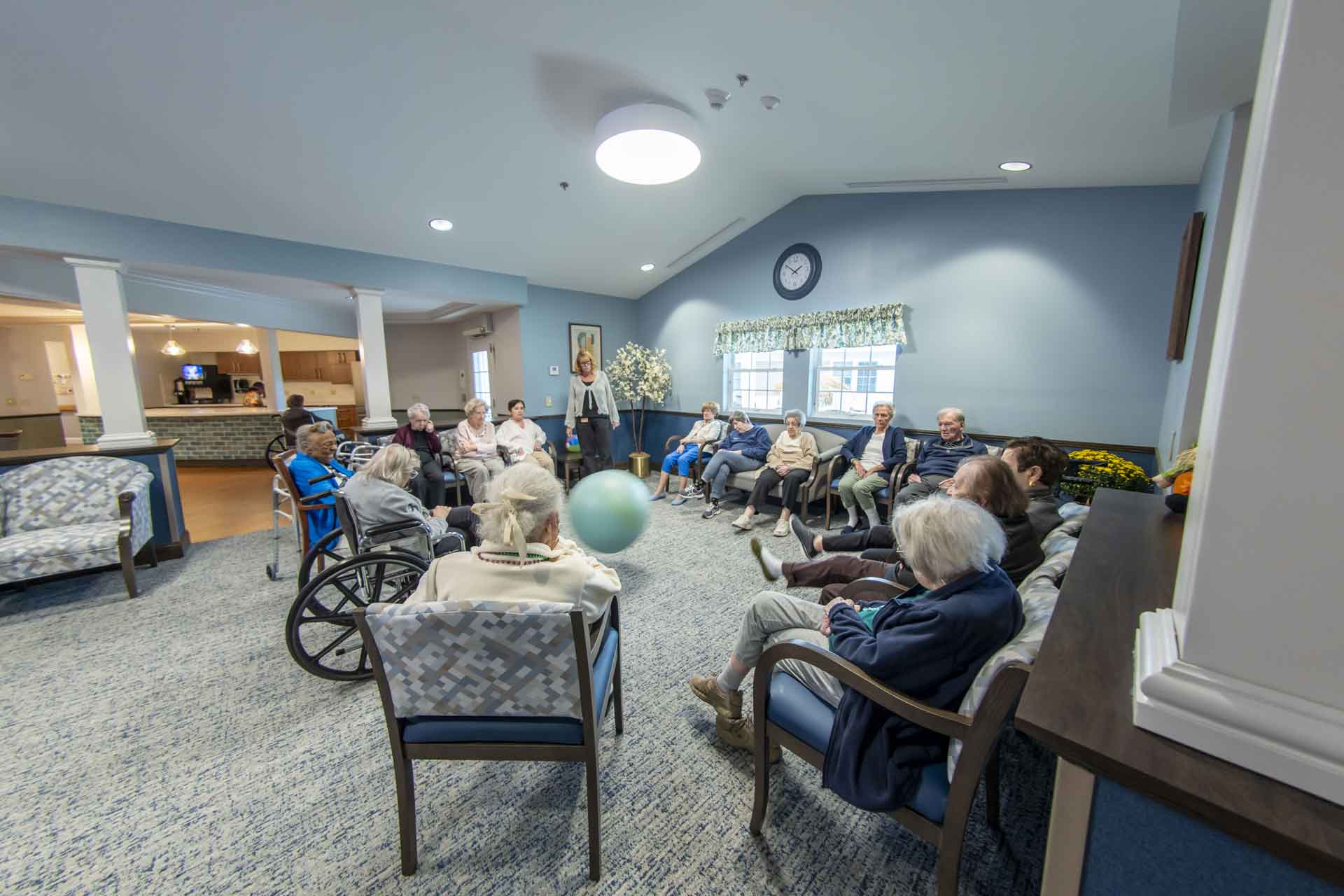 Residents participating in a group activity in a common area