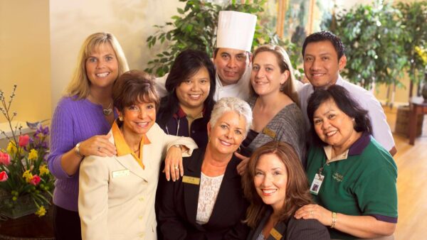 Staff and residents gather in a common area