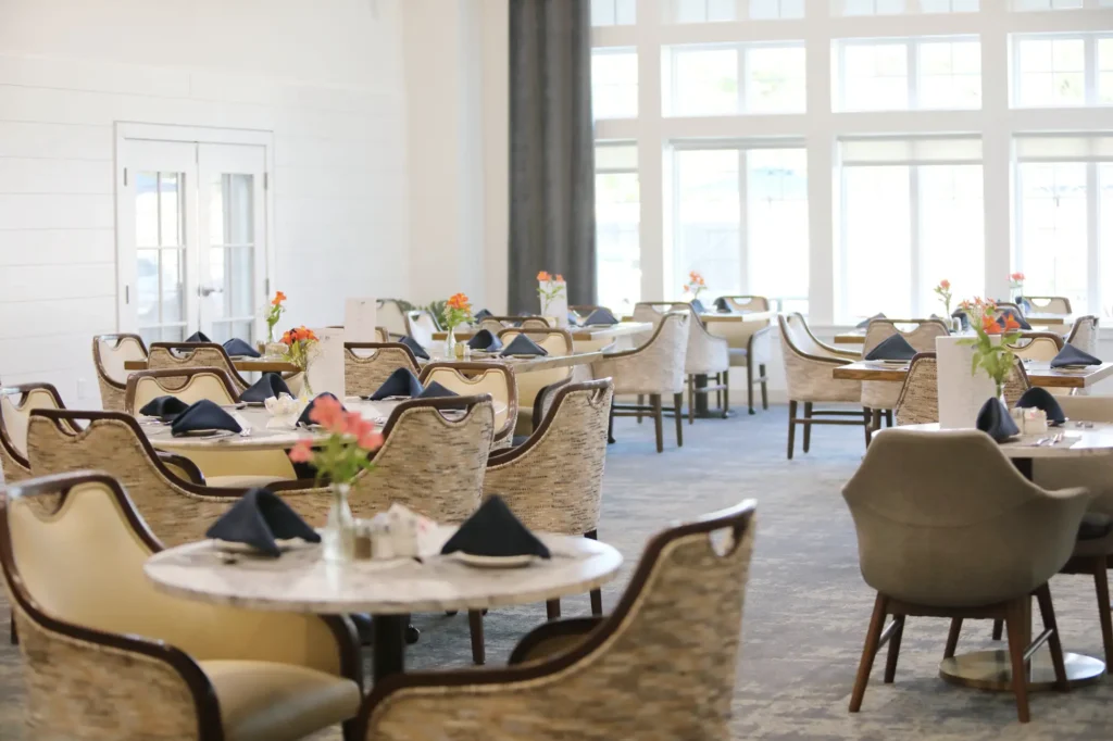 Elegant dining room setup with flowers and decor
