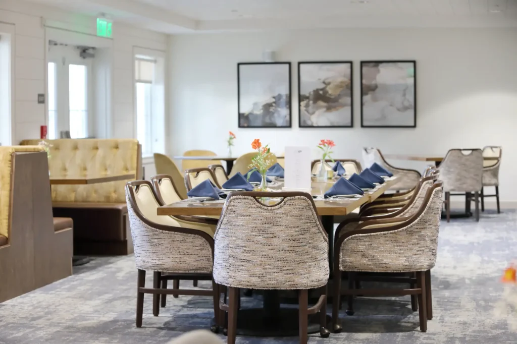Interior view of a dining area with tables and chairs