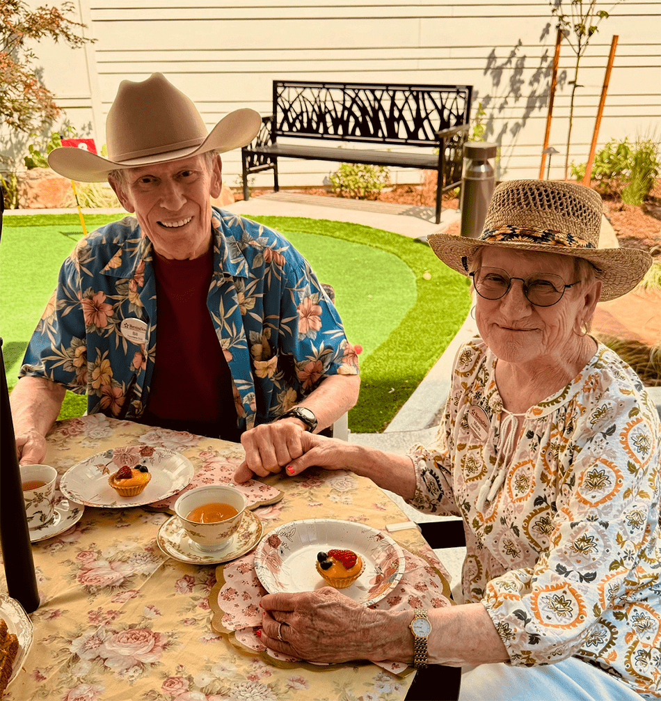 Residents enjoying dessert outside in the garden