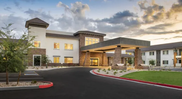 Exterior view of the facility entrance with landscaping
