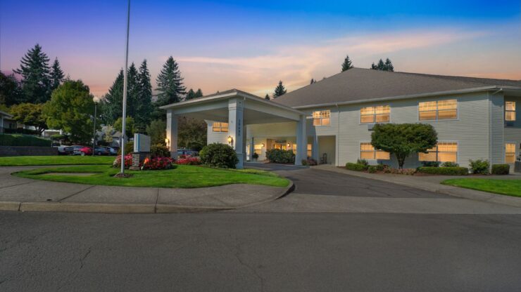 Exterior view of Cadence at Olney with landscaped entrance