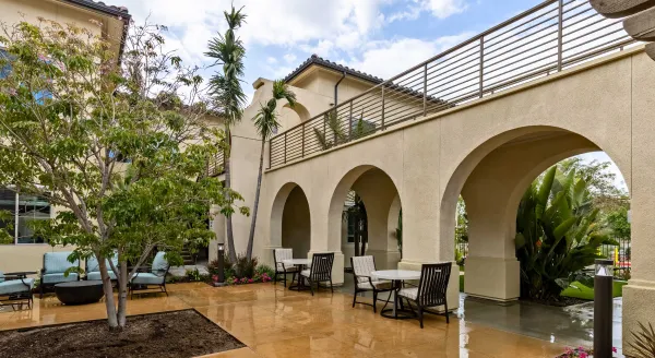 Outdoor seating area with a beautiful architectural archway
