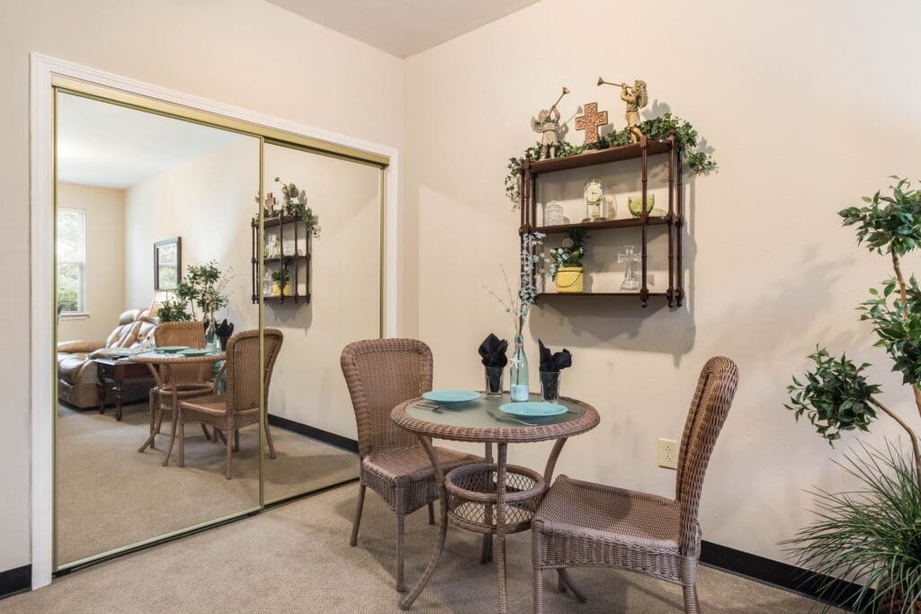 Cozy resident room with a dining table and chairs