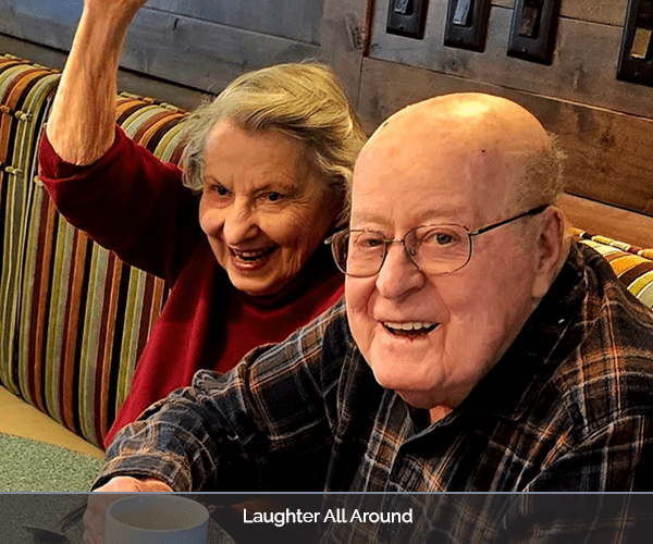 Residents enjoying a cheerful moment in a common area