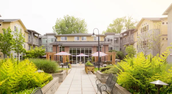 Outdoor view of the facility with gardens and seating