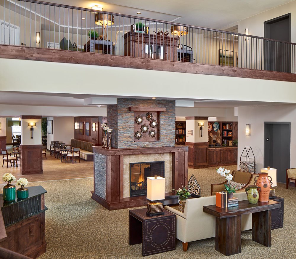 Interior common area with fireplace and seating