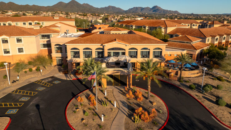 Aerial view of the facility's exterior with palm trees
