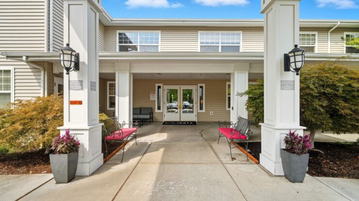 Entrance to Cadence at Olney with seating areas