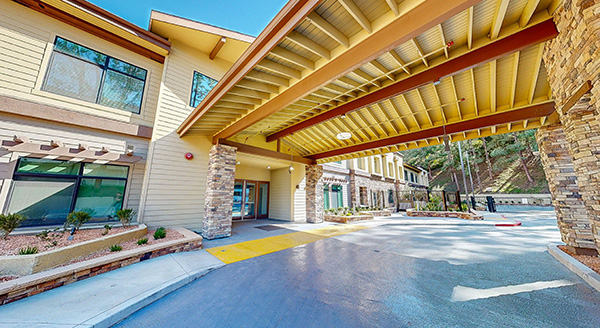Entrance of Cadence at Olney with covered drive-through