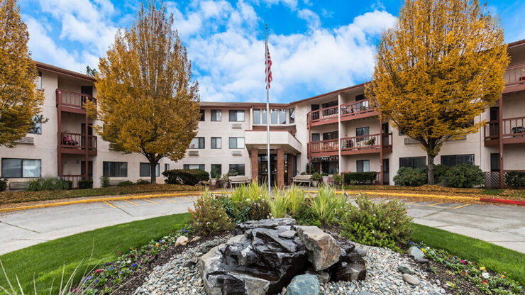 Exterior view of the facility with landscaped front area