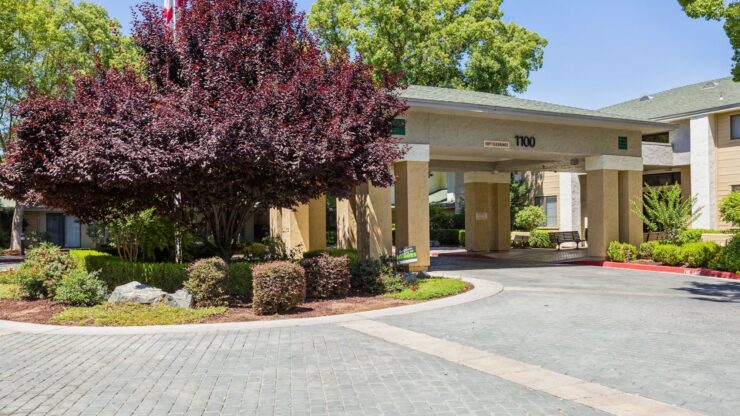 Entrance of Cadence at Olney surrounded by trees