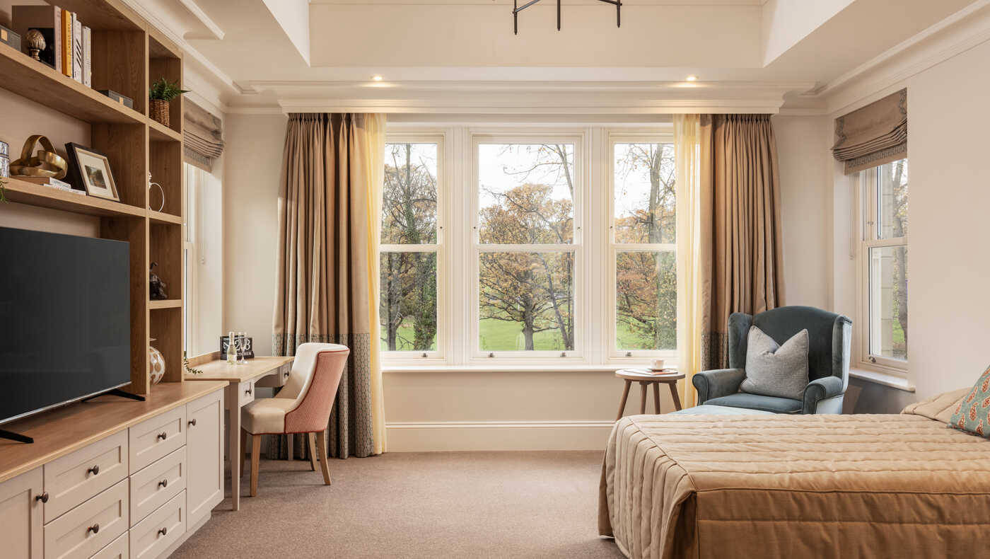 Bright private resident room with windows and a view