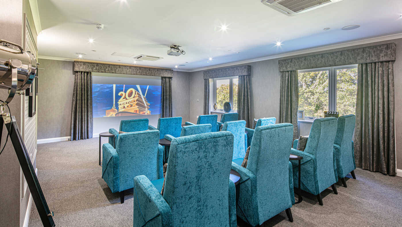 Bright activity room with comfortable seating