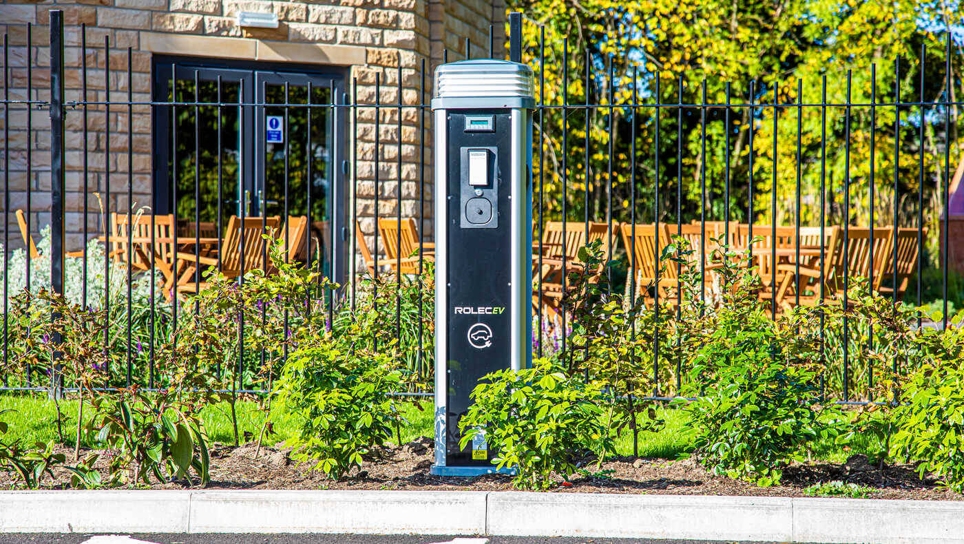 Outdoor space with seating and a charging station