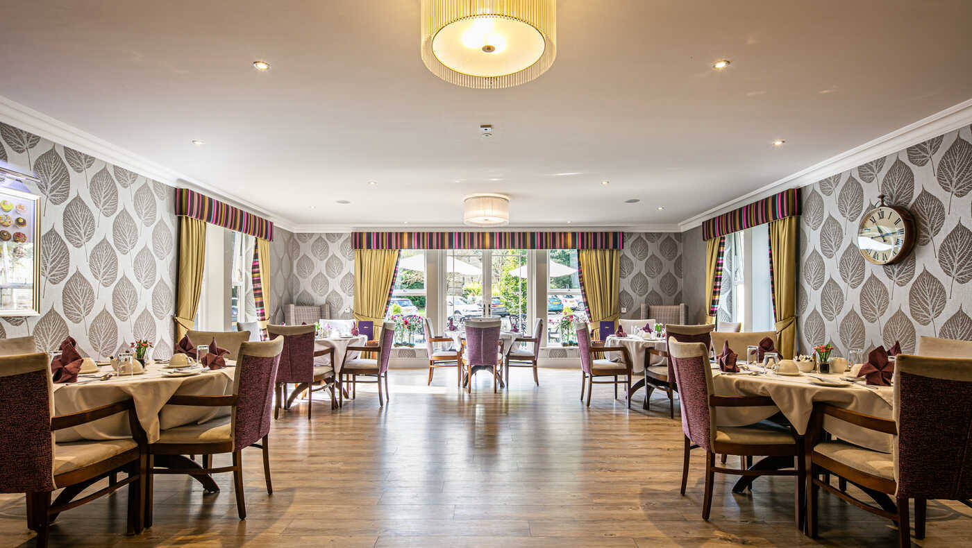 Bright dining room with elegant table settings