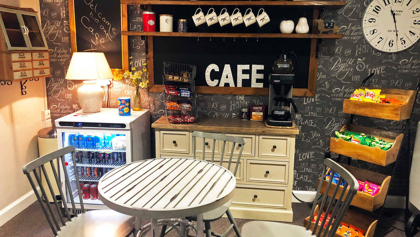 Cozy café area with snacks and coffee setup