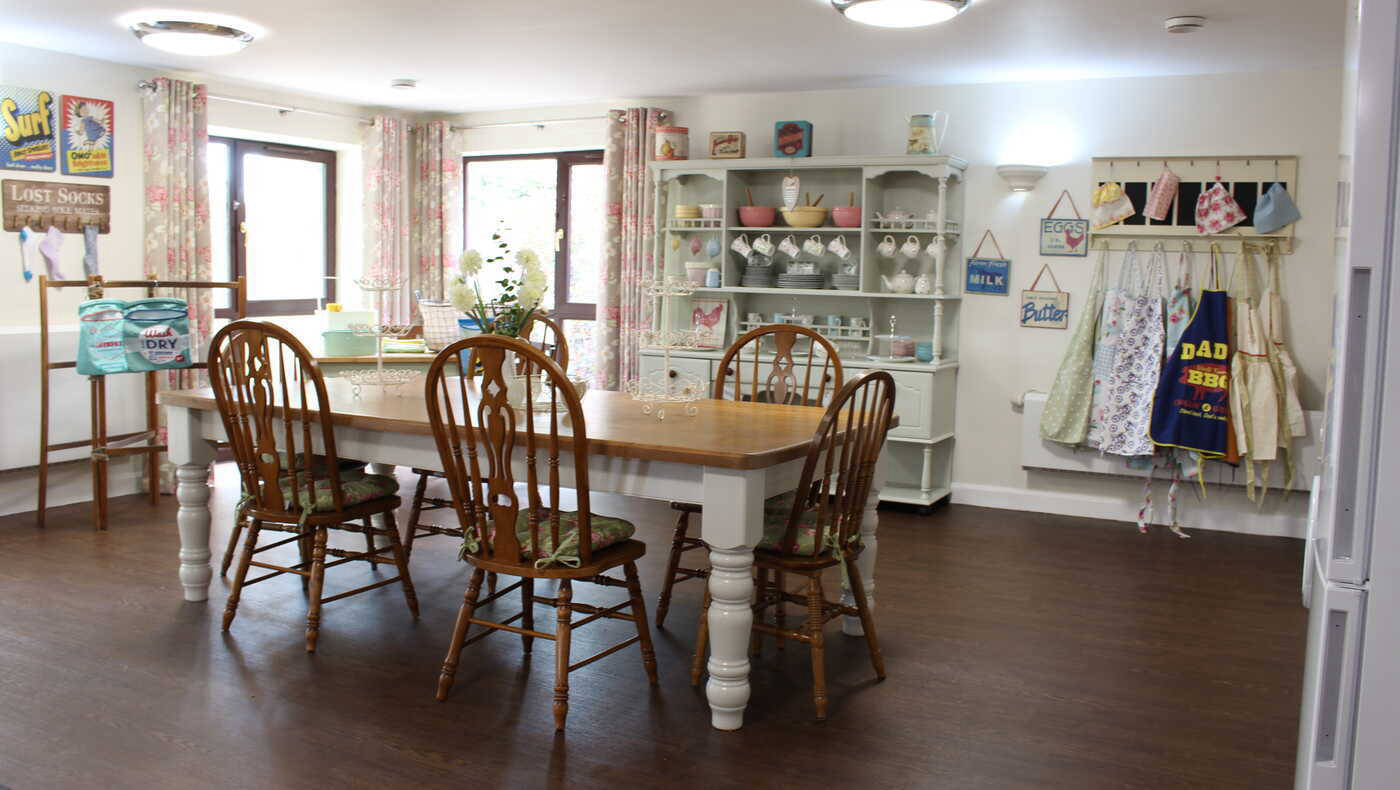 Bright common area with dining table and decor