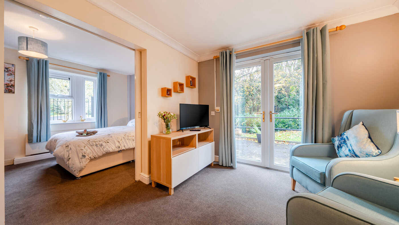 Cozy room with garden view in a senior living facility