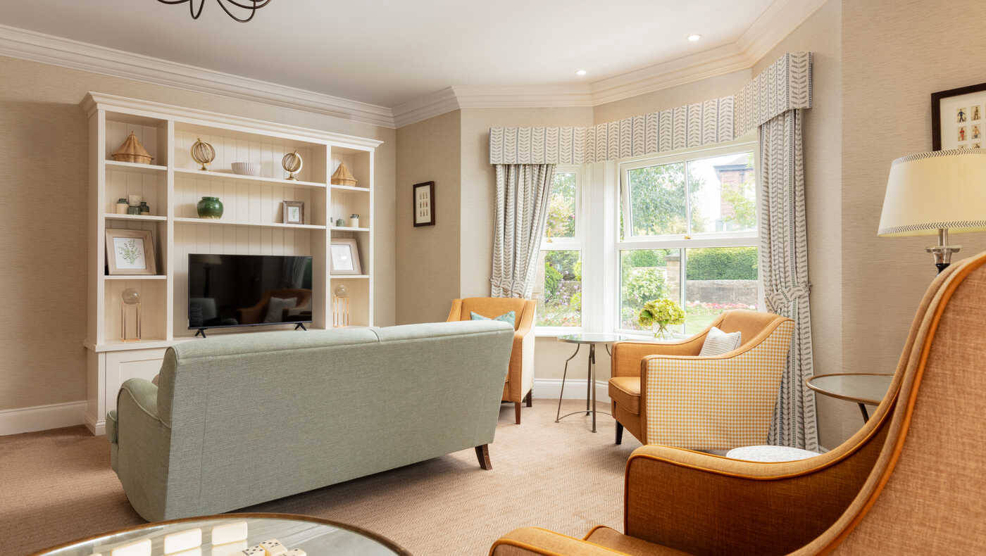 A cozy common area with seating and a view
