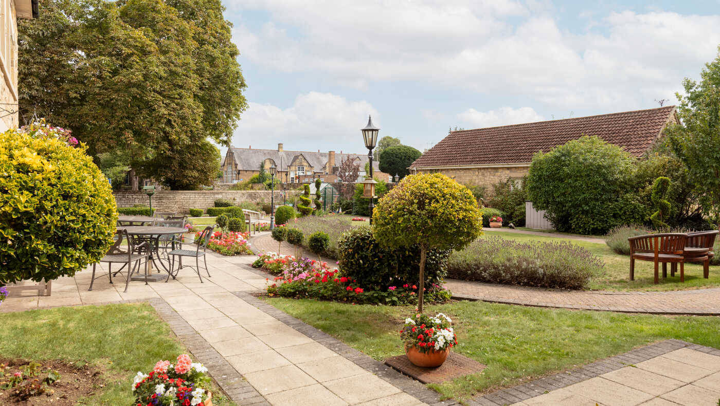 Beautifully landscaped outdoor garden area at Mill View