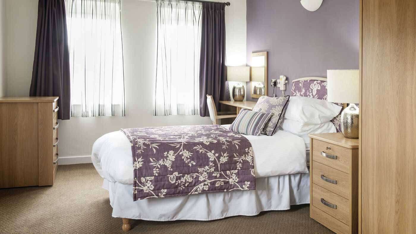 Comfortable bedroom in assisted living facility