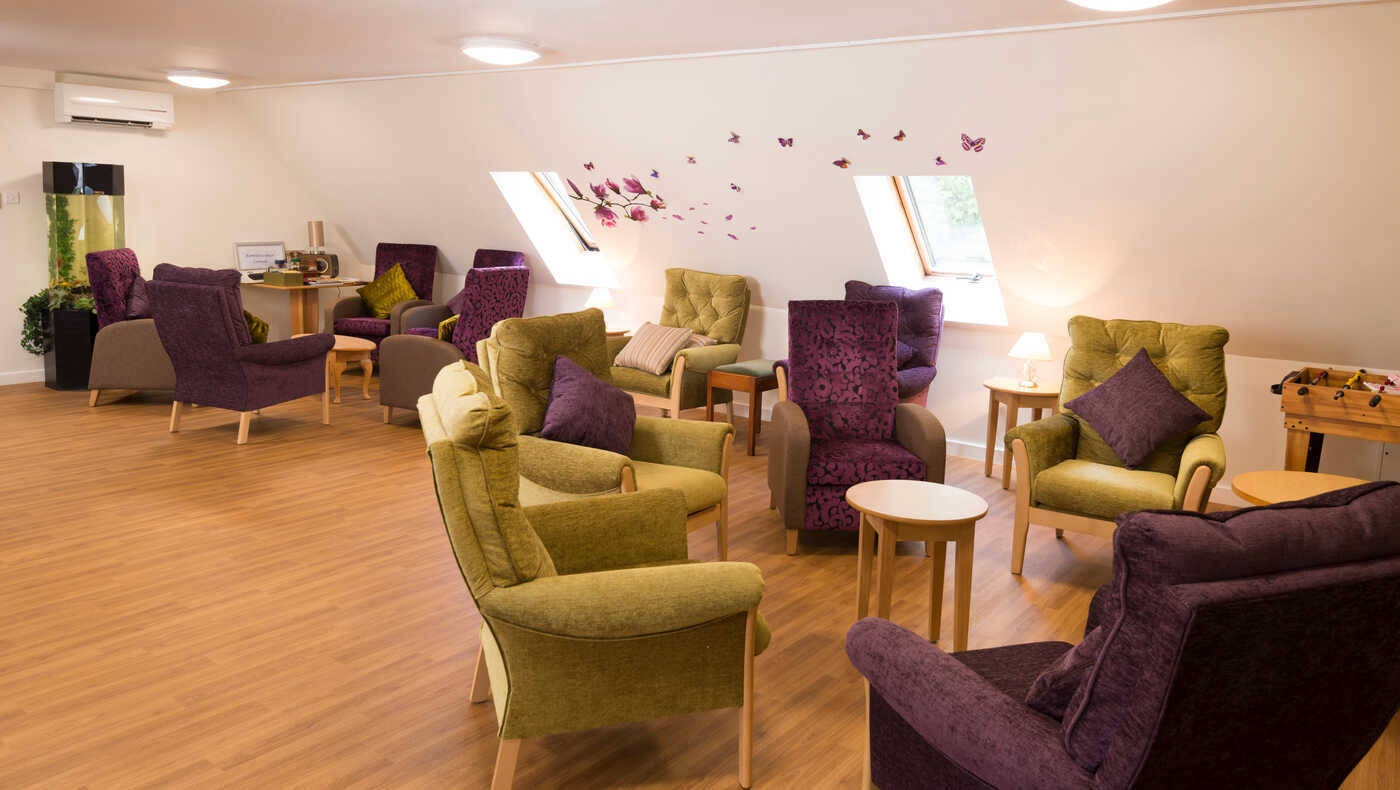 Bright common area with comfortable seating and decor