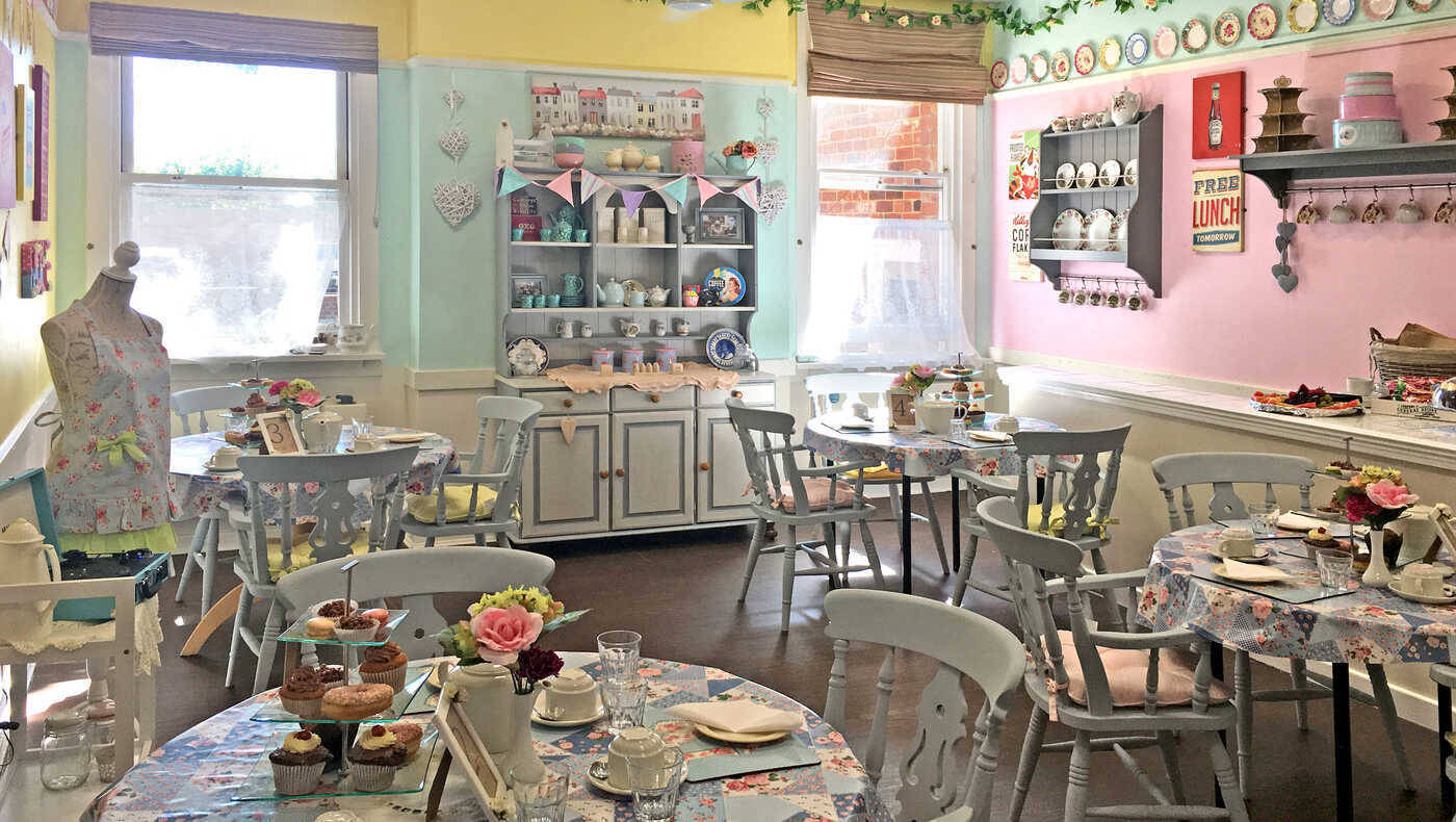 Bright dining room with tables set for tea