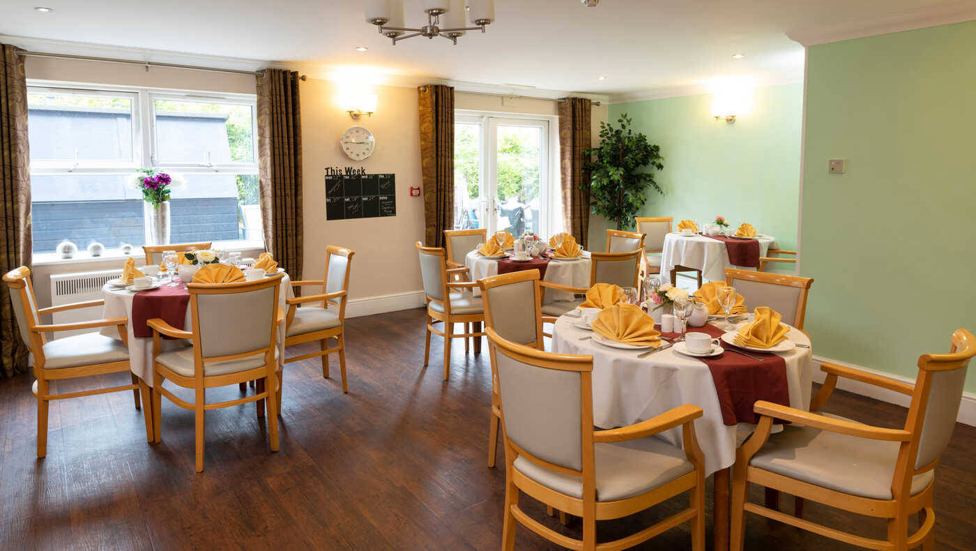 Dining area with tables set for a meal