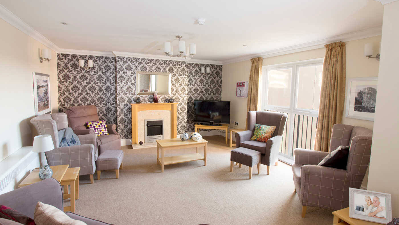 Bright common area with seating and decorative elements