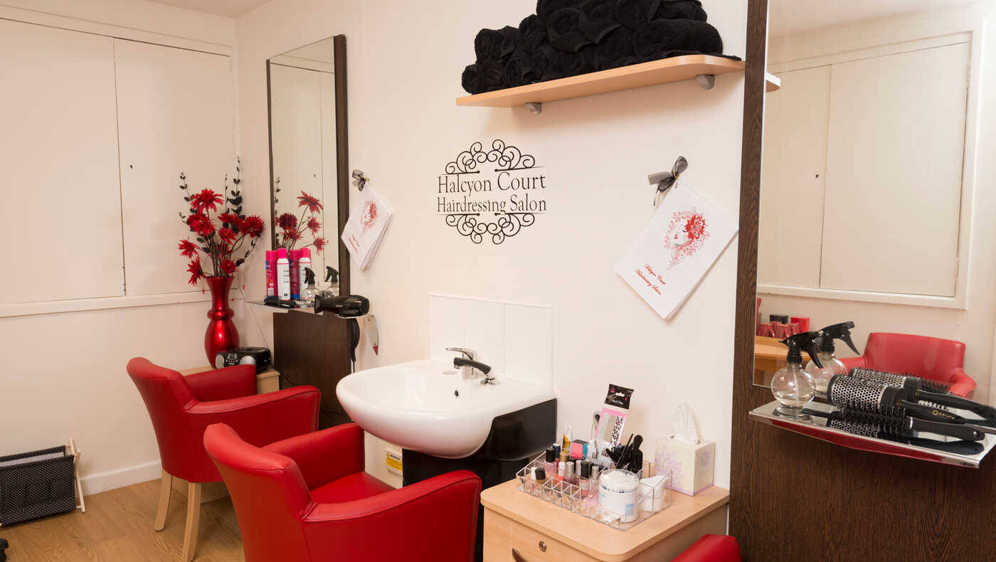 Interior view of a hair salon with styling chairs
