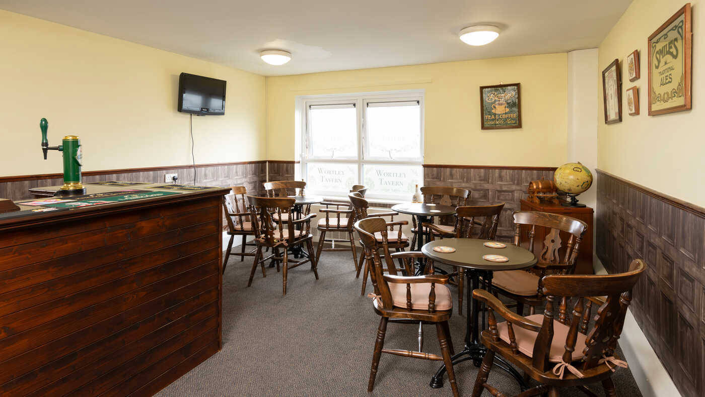 Interior view of a social area with wooden furniture
