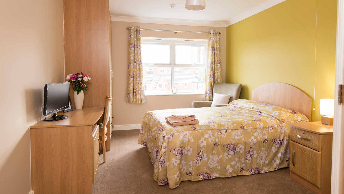 Cozy private room with a bed and decor