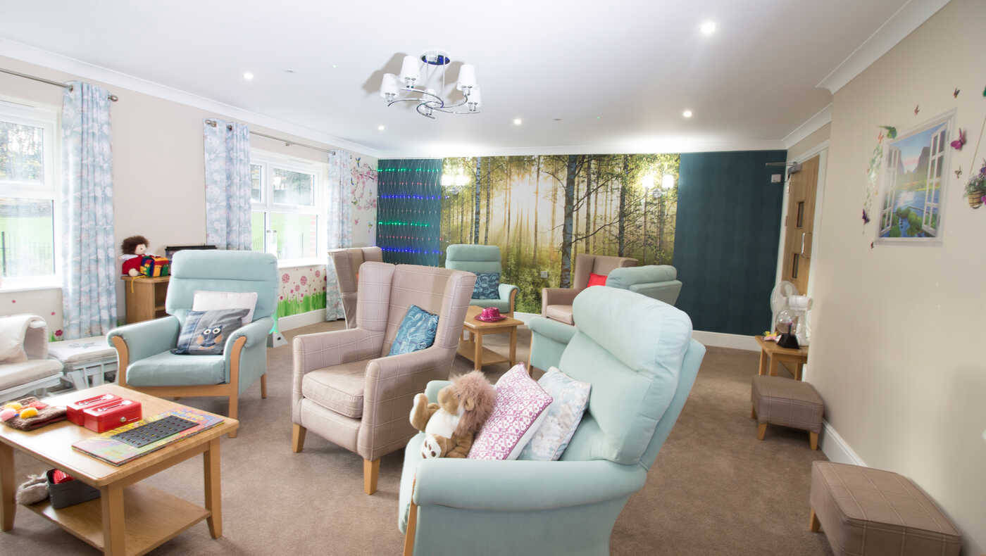 Common area with chairs and soft furnishings